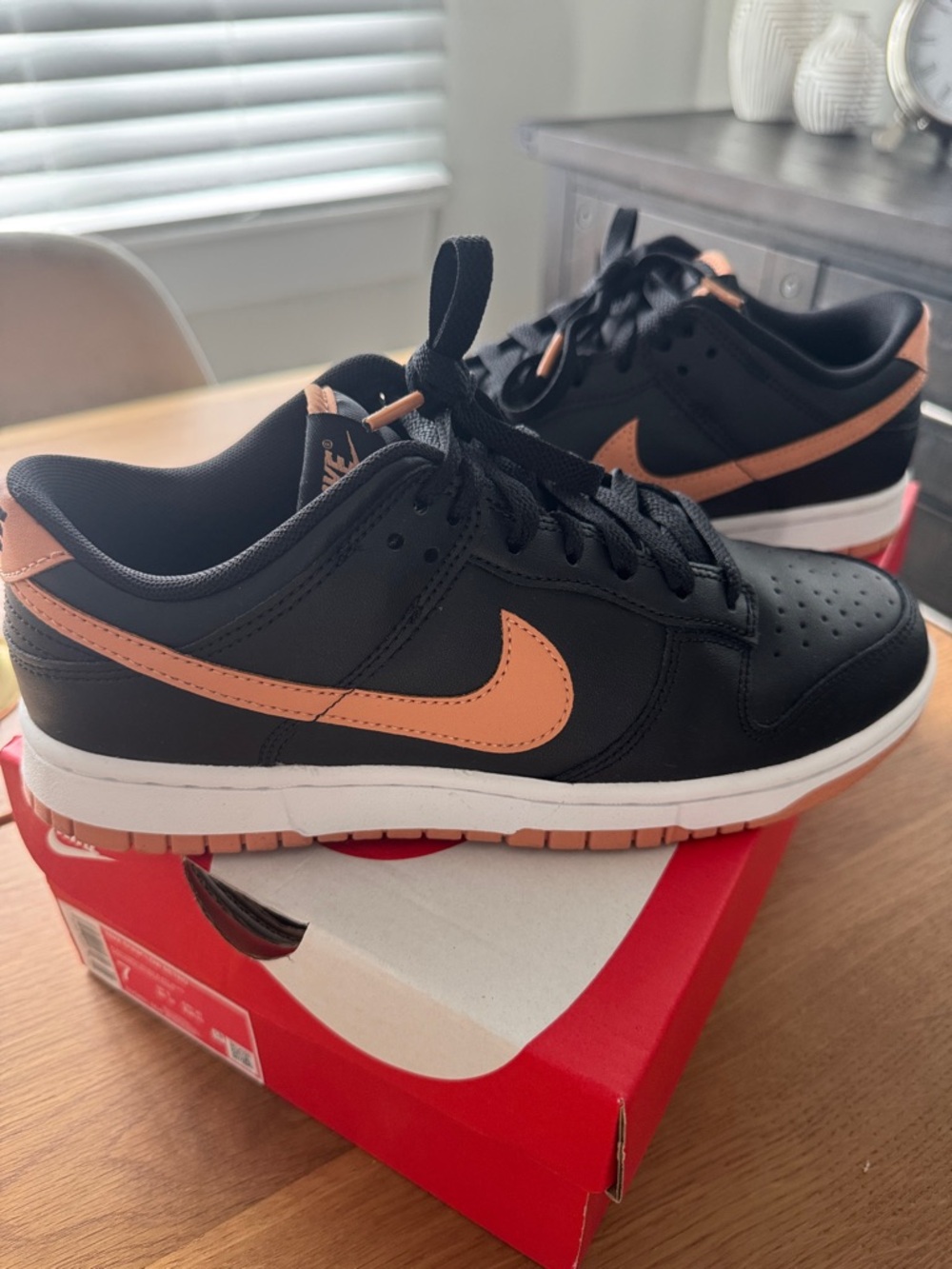 Nike Dunk Low Retro Black Sneakers with Peach Swoosh